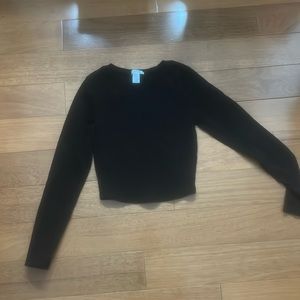 Tight black long sleeved shirt